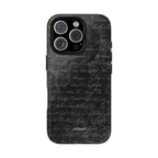 exoletus Magsafe case featuring a stylish black design with handwritten text pattern on the back.