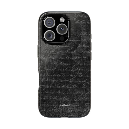 exoletus Magsafe case featuring a stylish black design with handwritten text pattern on the back.