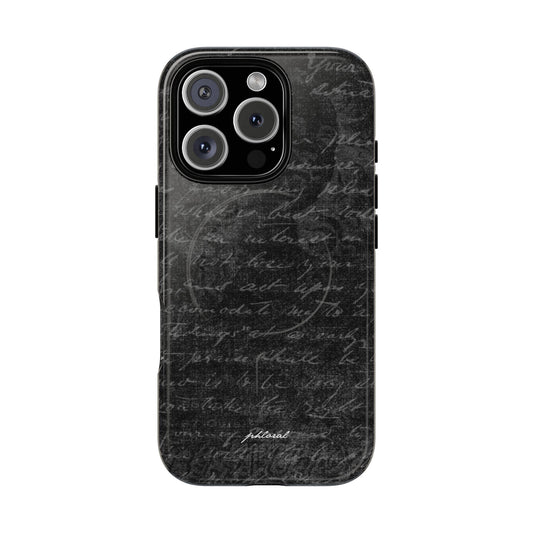 exoletus Magsafe case featuring a stylish black design with handwritten text pattern on the back.