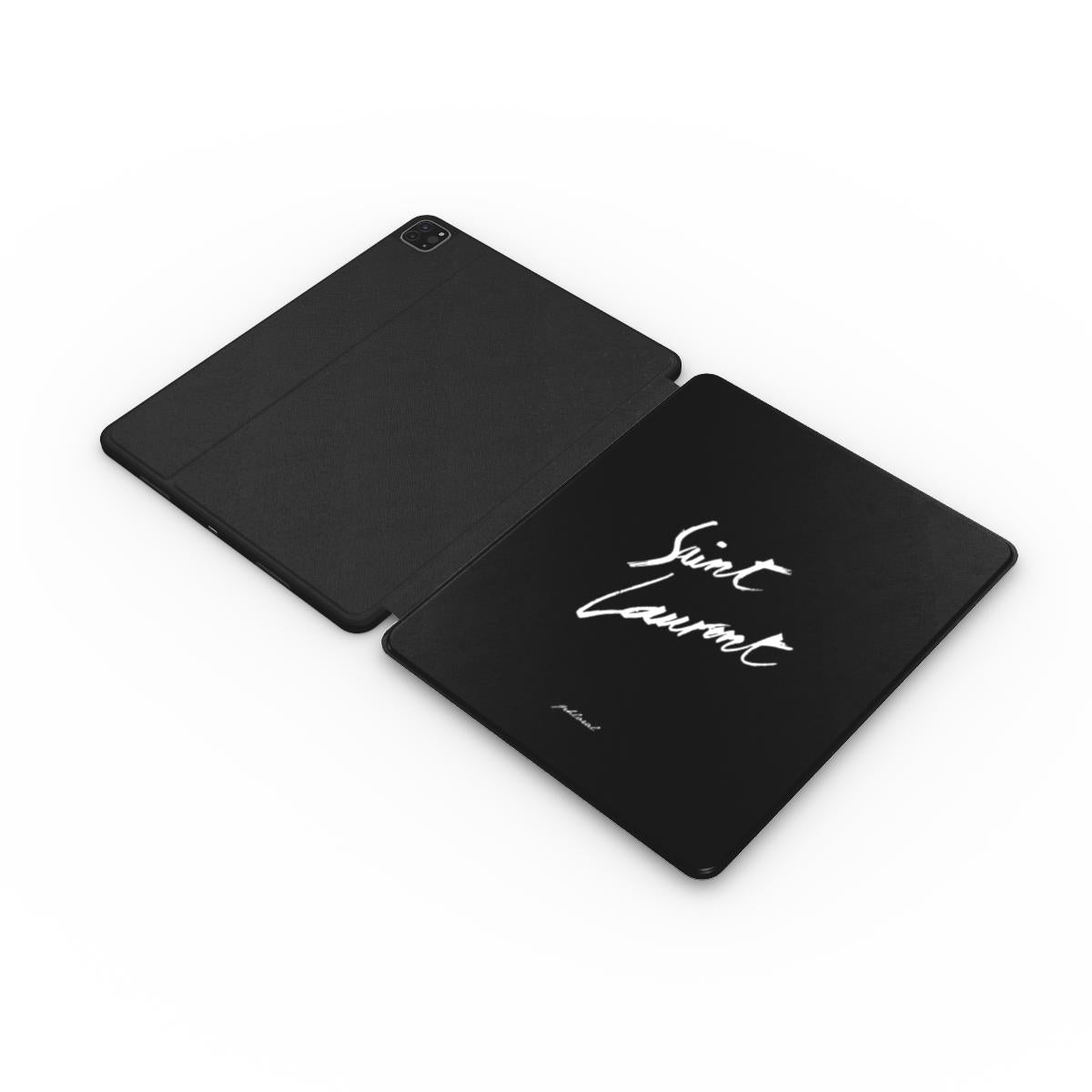YSL opulent nero marquina phone case nestled in velvet-lined luxury packaging